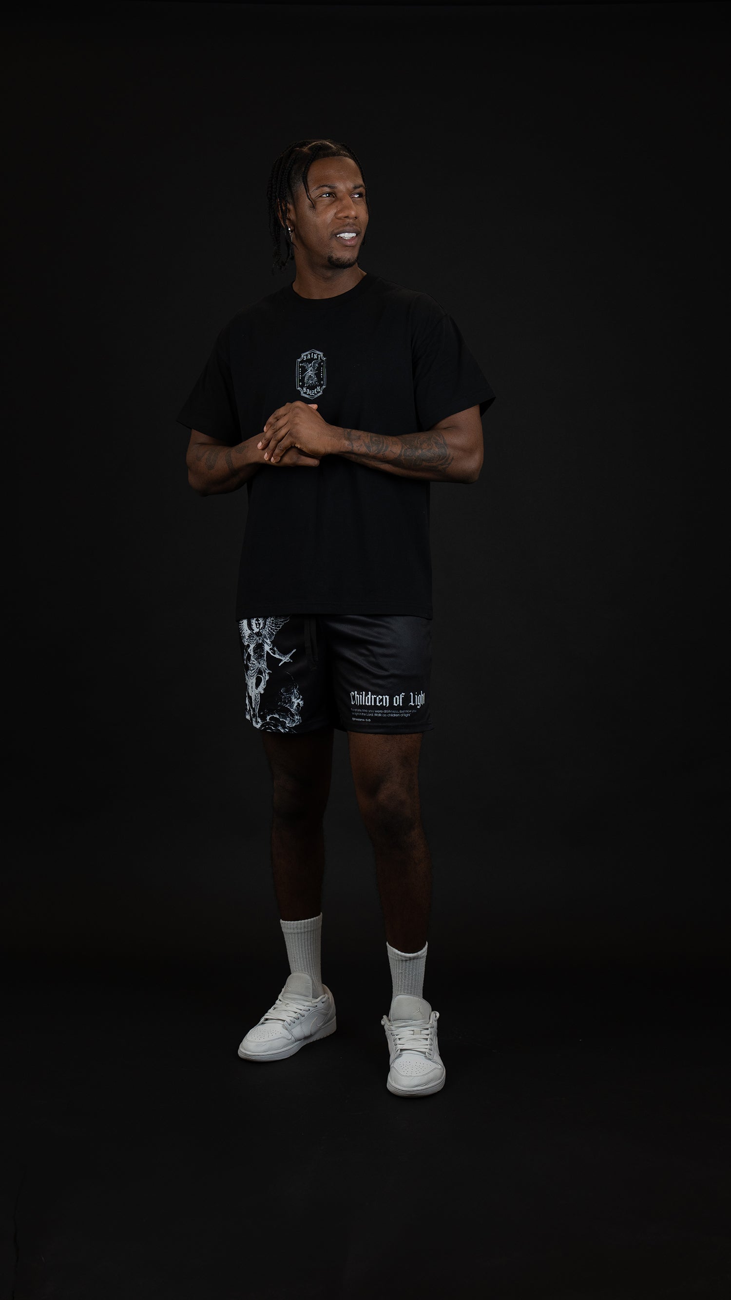 Saint Kaizen Christian gym wear shirt. Features the bold Guardian Of The Light T-Shirt - Black spiritual design. Oversize fit made from premium 220gr cotton.