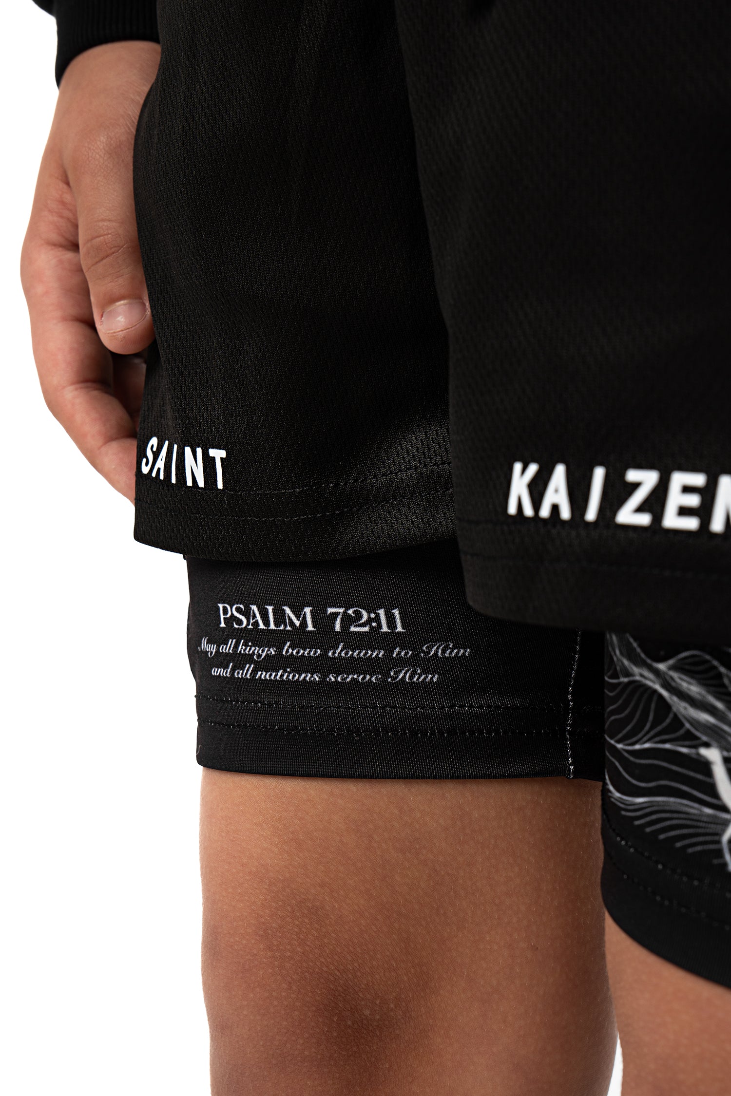 Saint Kaizen Christian gym wear Guiding Light Youth Performance Shorts. Two-layer shorts built for optimal mobility, featuring secure pockets and premium fabric.