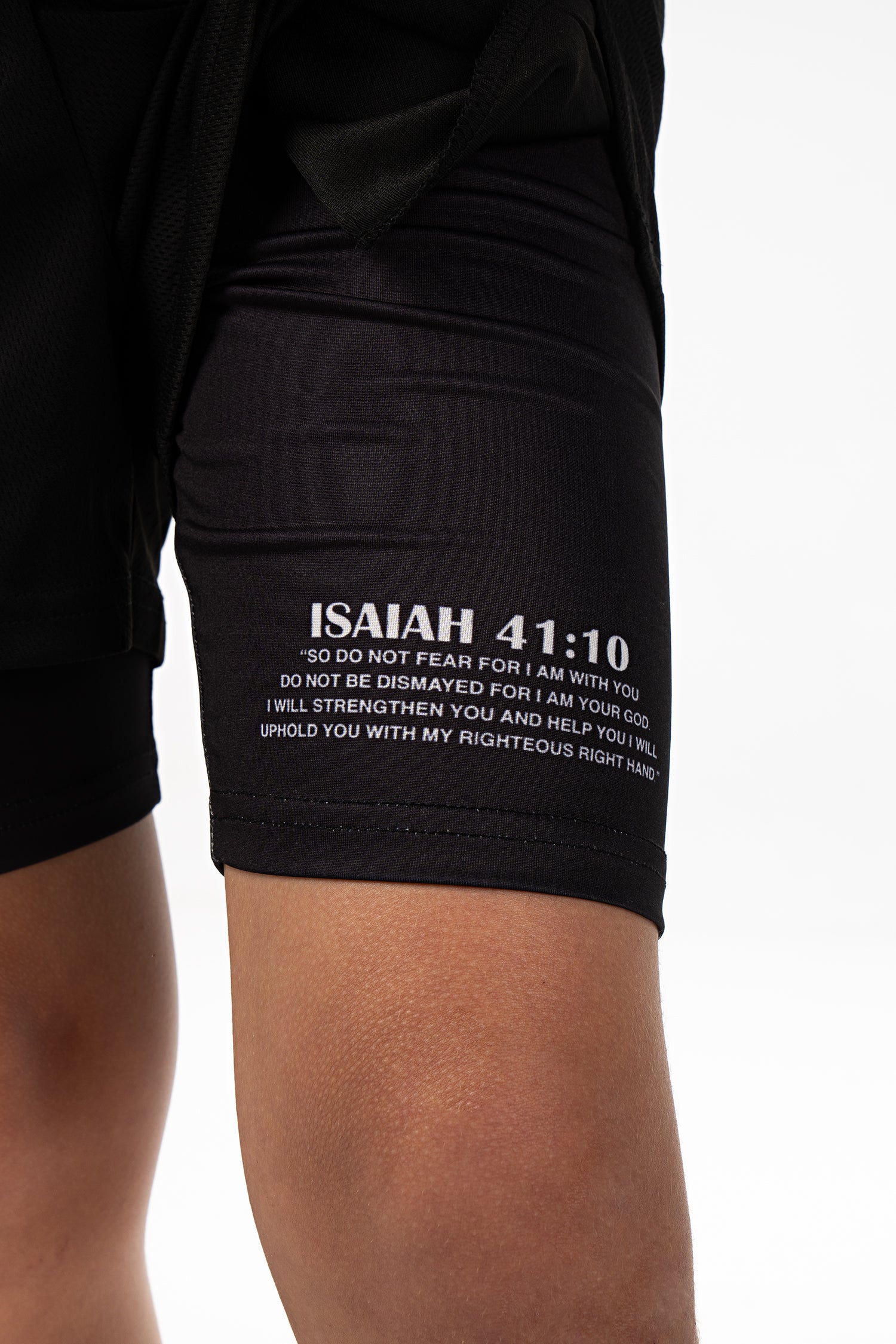 Saint Kaizen Christian gym wear Isaiah 41:10 Youth Performance Shorts. Two-layer shorts built for optimal mobility, featuring secure pockets and premium fabric.