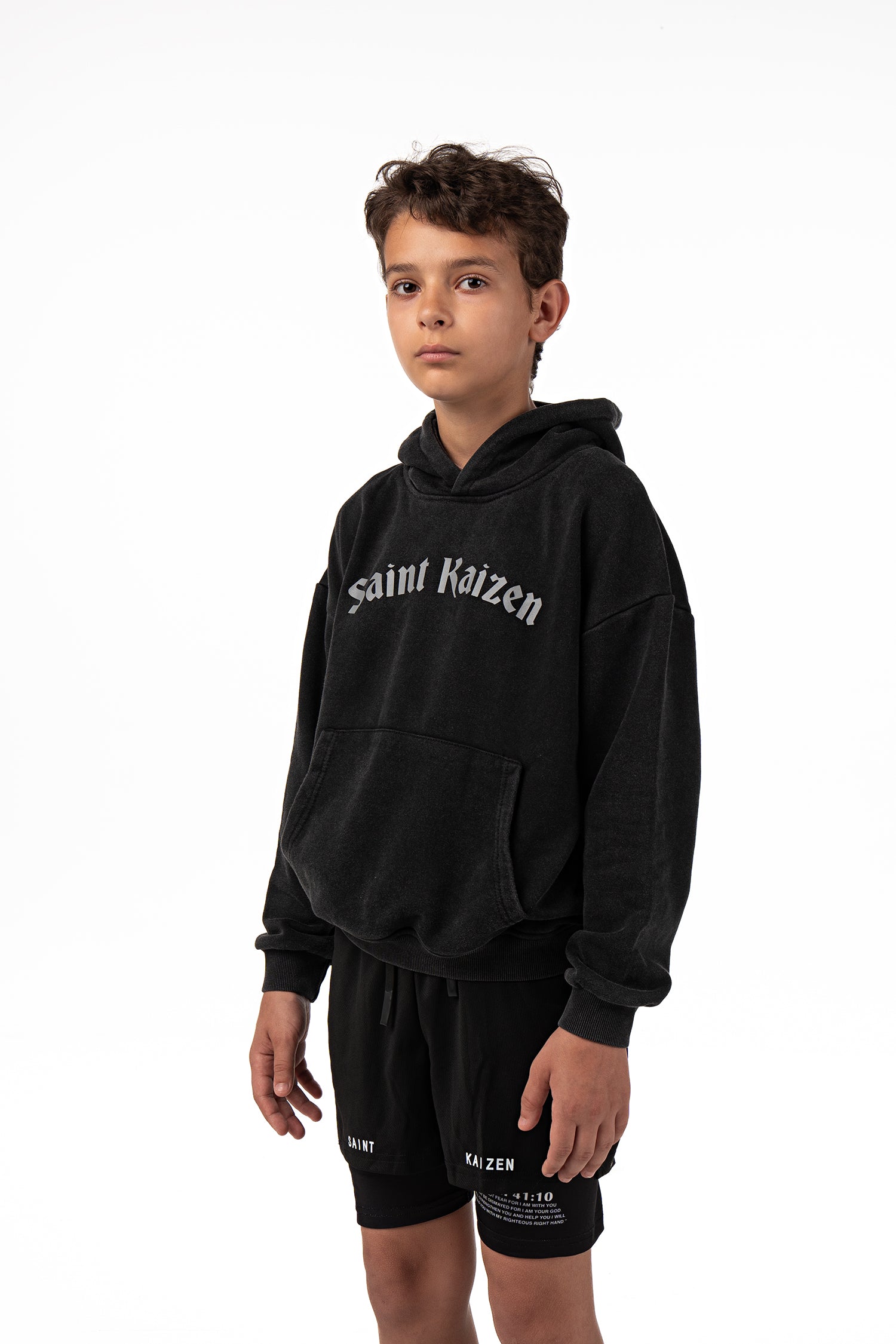 Saint Kaizen Christian gym wear Isaiah 41:10 Youth Performance Shorts. Two-layer shorts built for optimal mobility, featuring secure pockets and premium fabric.