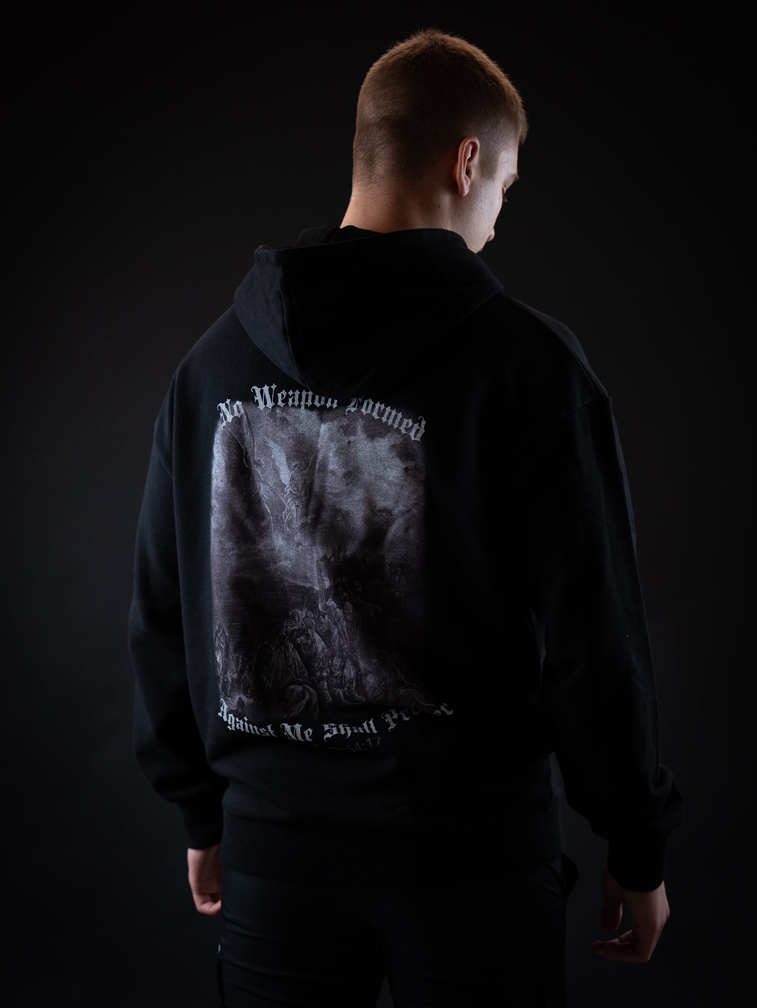 Saint Kaizen Isaiah 54:17 Hoodie - Black. Heavyweight Christian gym wear hoodie featuring a durable with spiritual artwork.