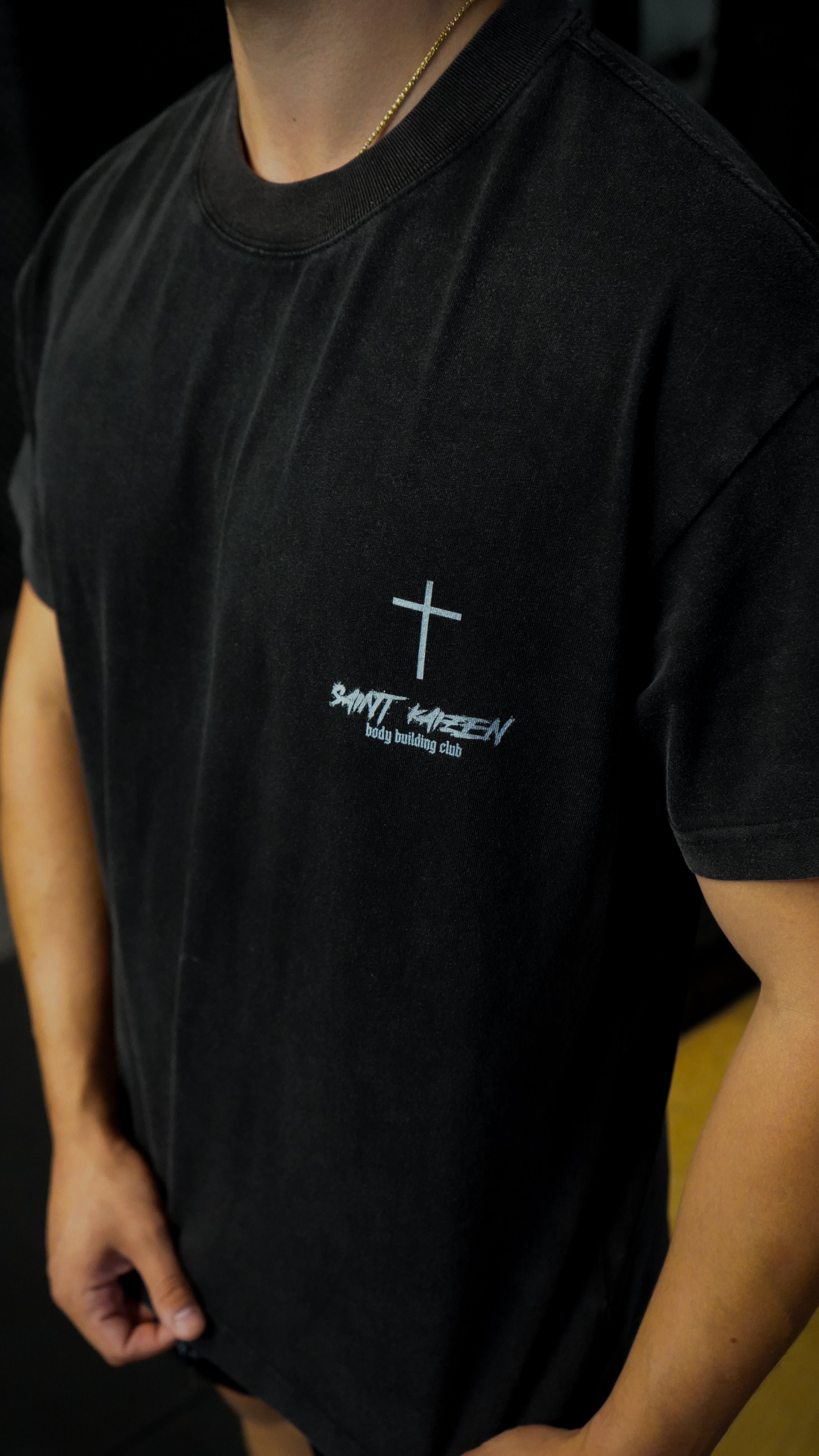 Saint Kaizen Christian gym wear shirt. Features the bold Isaiah 54:17 Verse T-Shirt spiritual design. Oversize fit made from premium 220gr cotton.