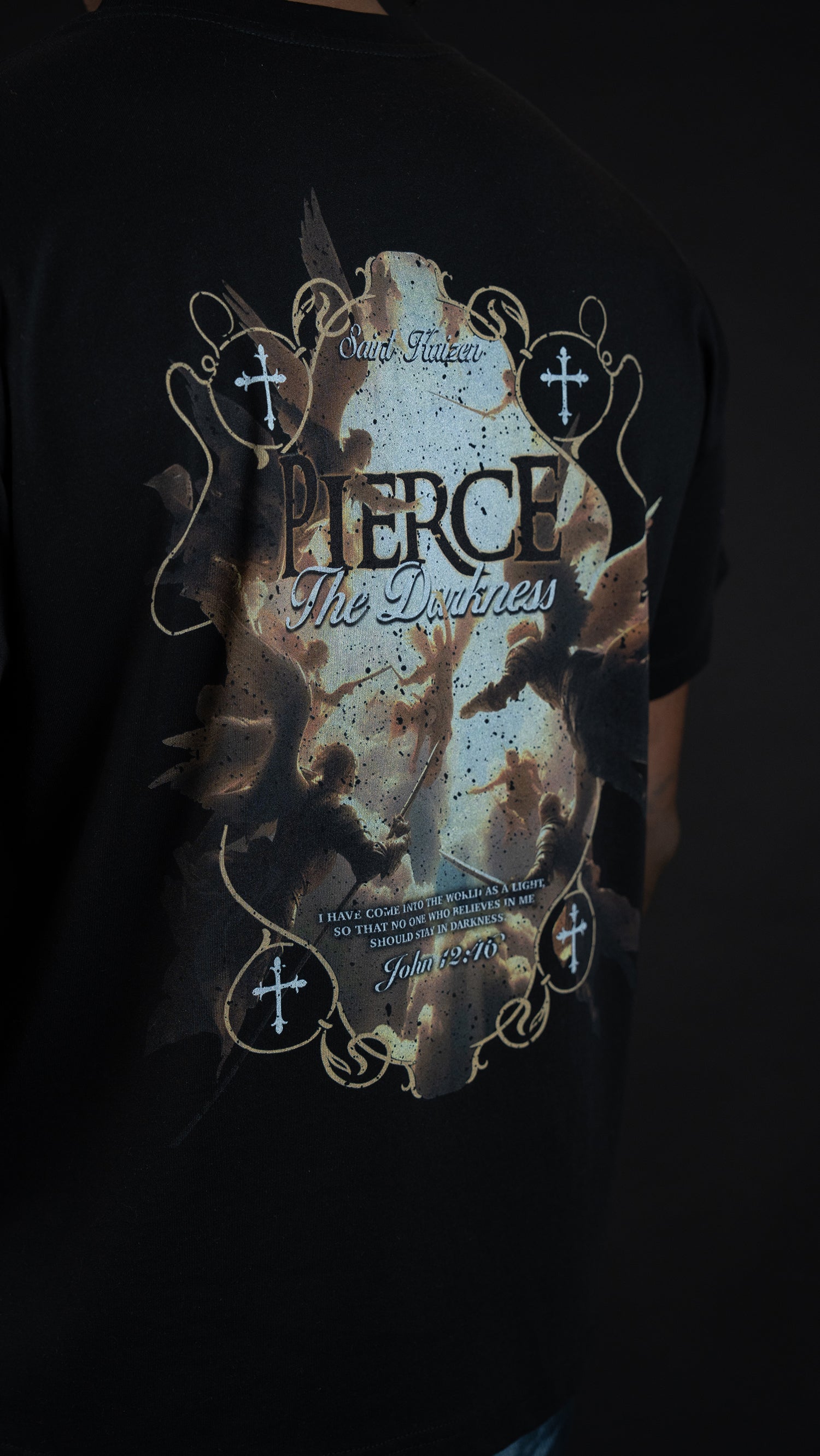 Saint Kaizen Christian gym wear shirt. Features the bold Pierce The Darkness T-Shirt - Black spiritual design. Oversize fit made from premium 220gr cotton.