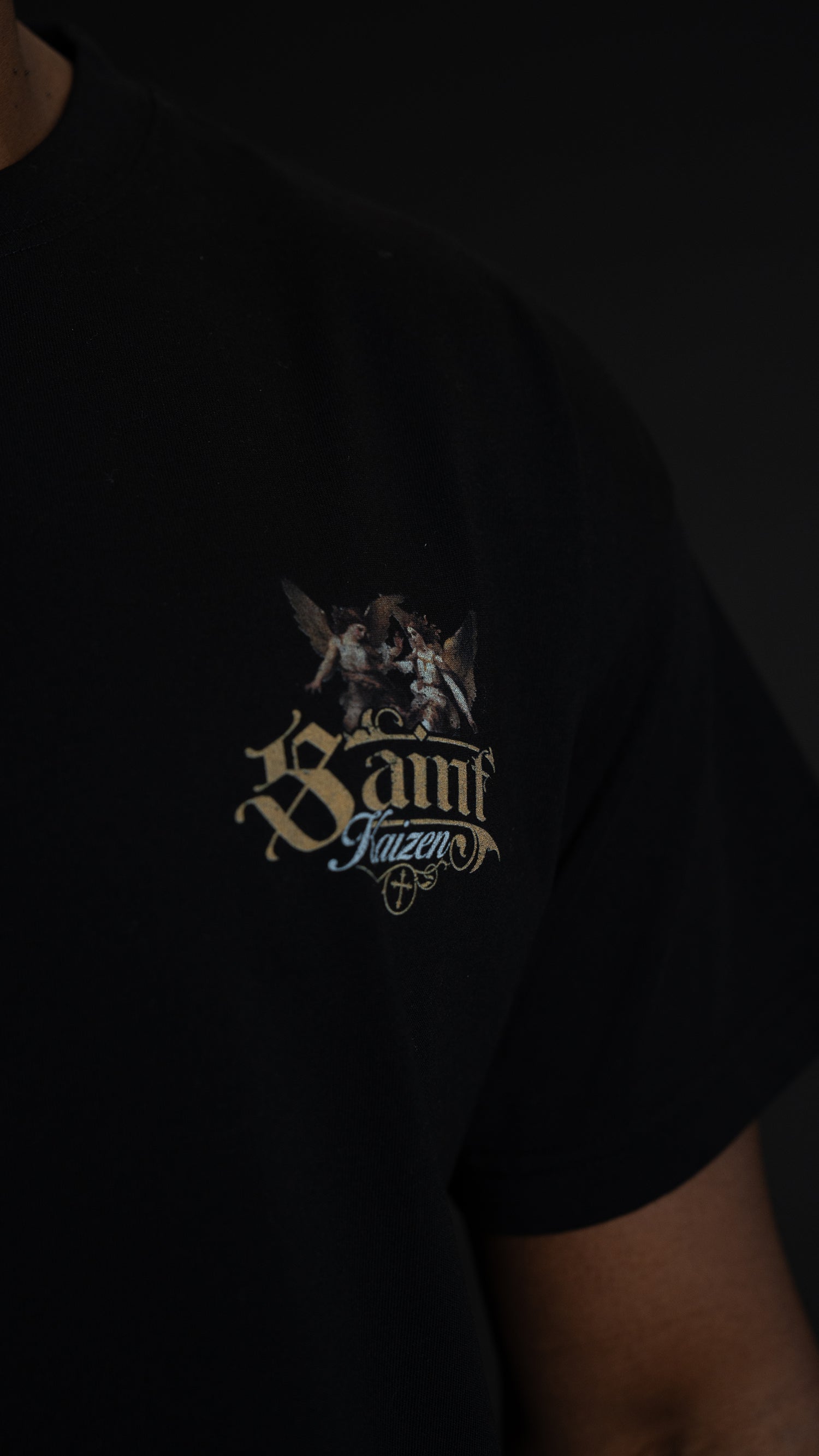 Saint Kaizen Christian gym wear shirt. Features the bold Pierce The Darkness T-Shirt - Black spiritual design. Oversize fit made from premium 220gr cotton.