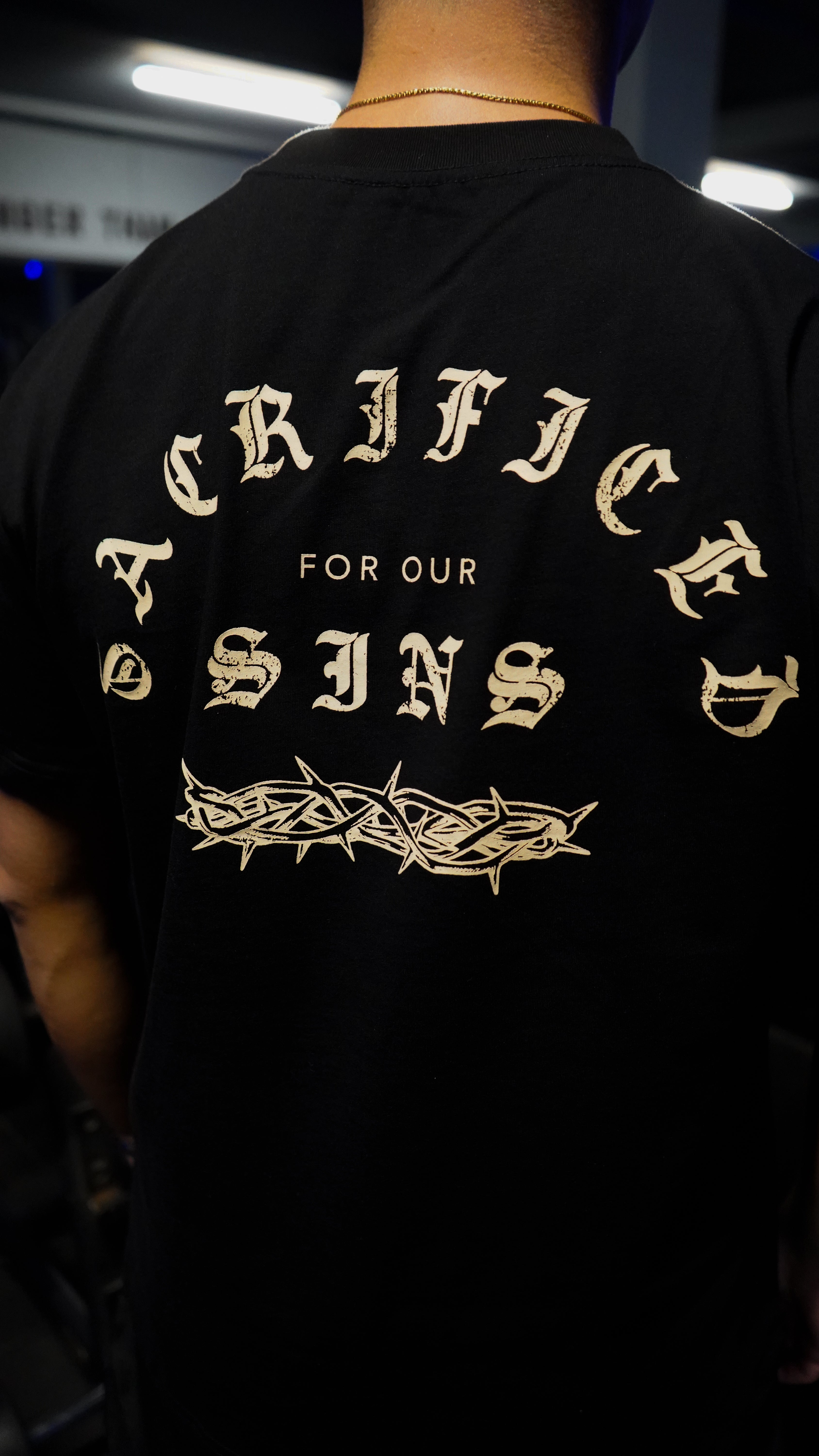 Saint Kaizen Christian gym wear shirt. Features the bold Sacrificed for Our Sins T-Shirt spiritual design. Oversize fit made from premium 220gr cotton.