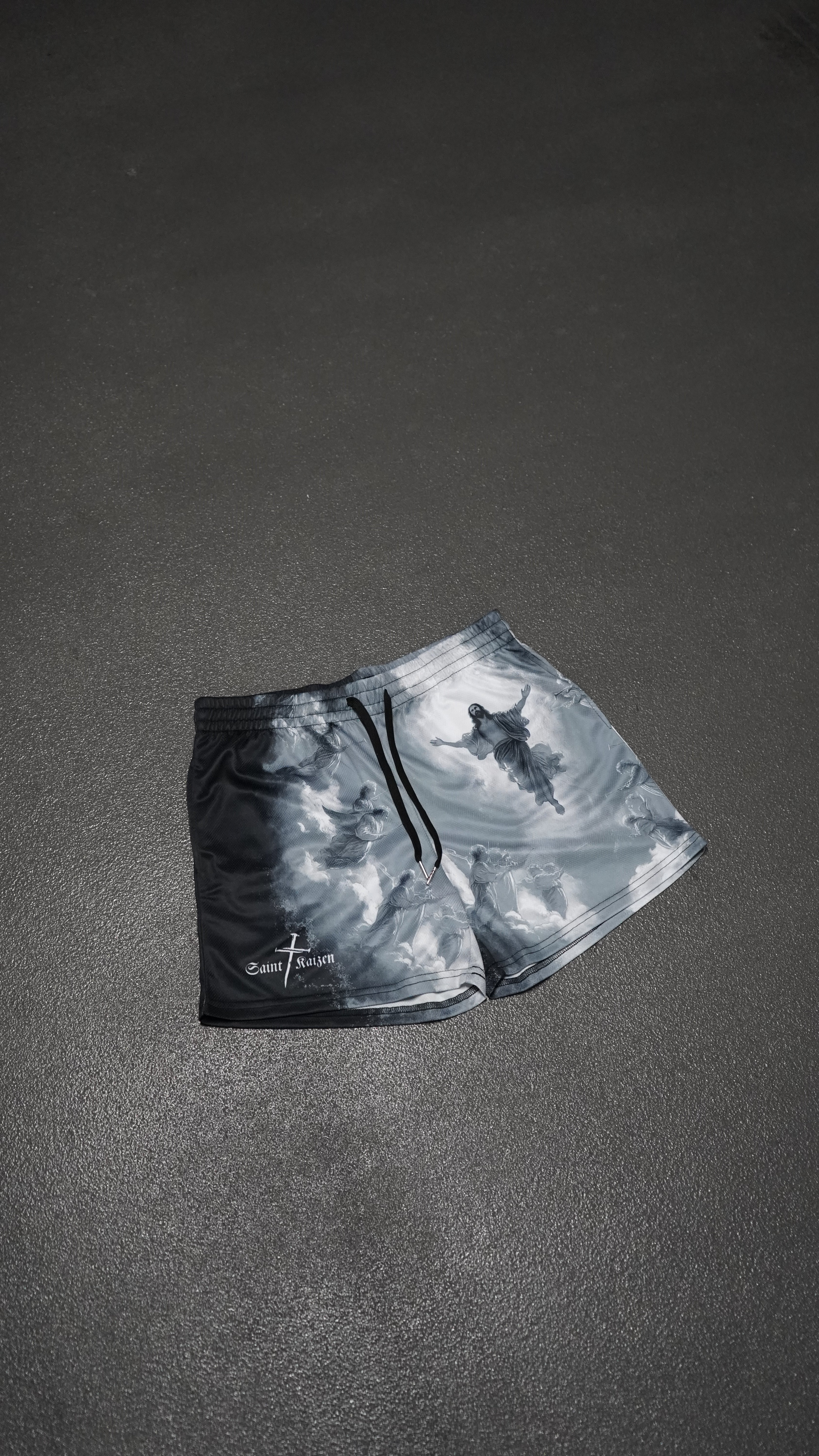 Saint Kaizen Christian gym wear Saviour Shorts. Lightweight 100% polyester mesh with bold printed spiritual design. Features a 5-inch inseam for mobility.