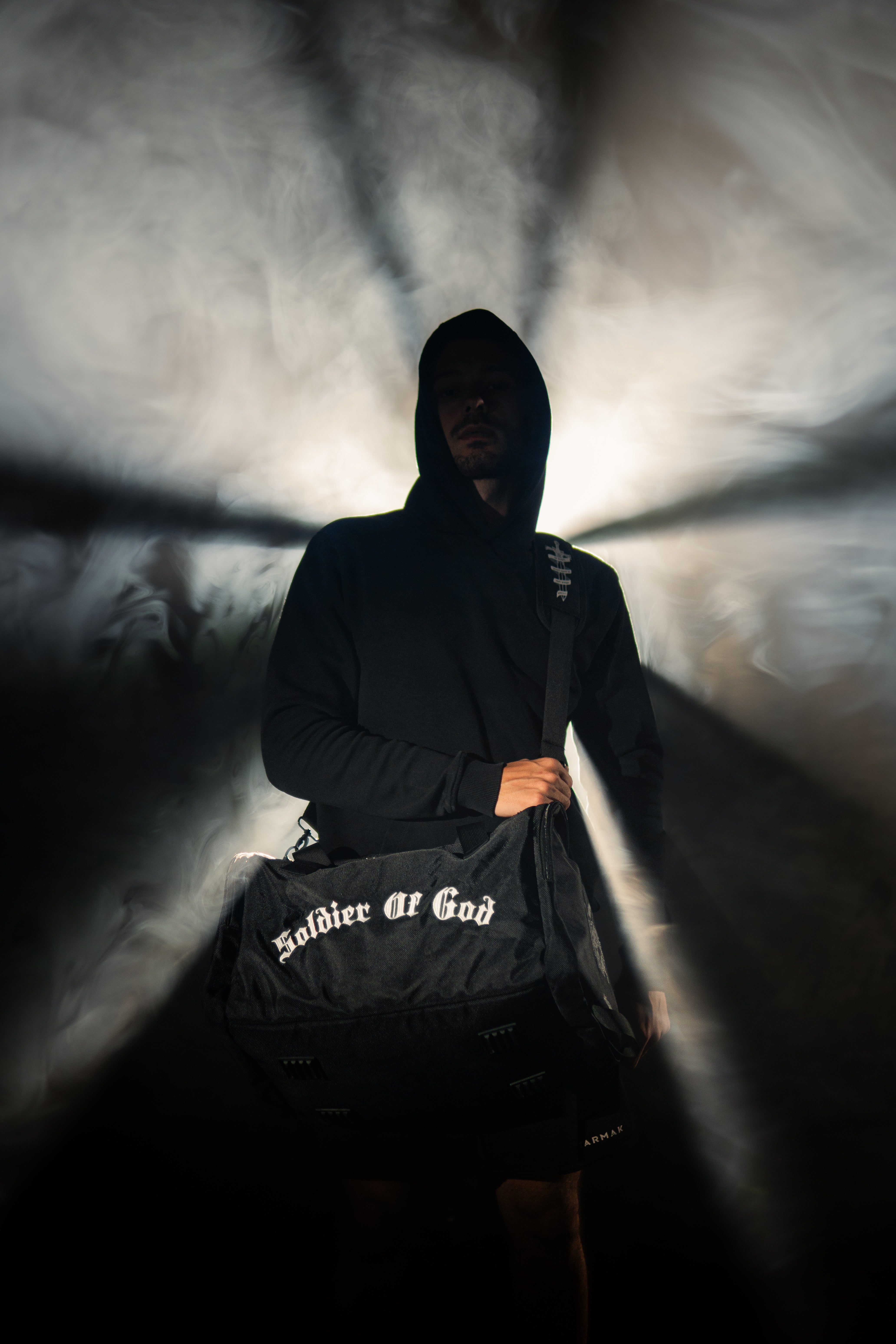 Saint Kaizen Christian gym duffle bag. Features the Soldier of God Duffle Bag verse, powerful spiritual artwork, and detailed embroidery for Christian athletes.