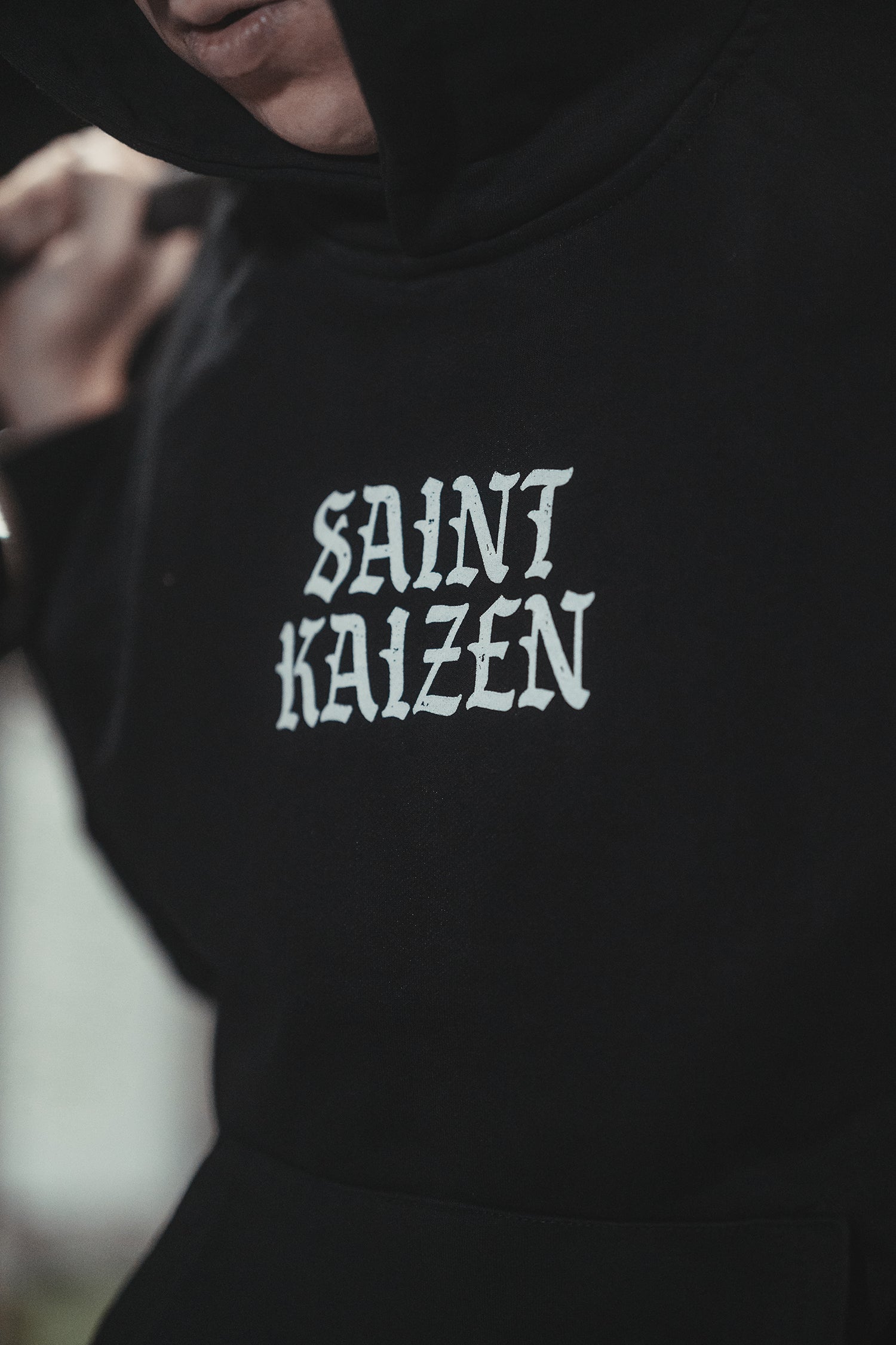 Saint Kaizen Soldier of God Hoodie Black. Heavyweight Christian gym wear hoodie featuring a durable with spiritual artwork.