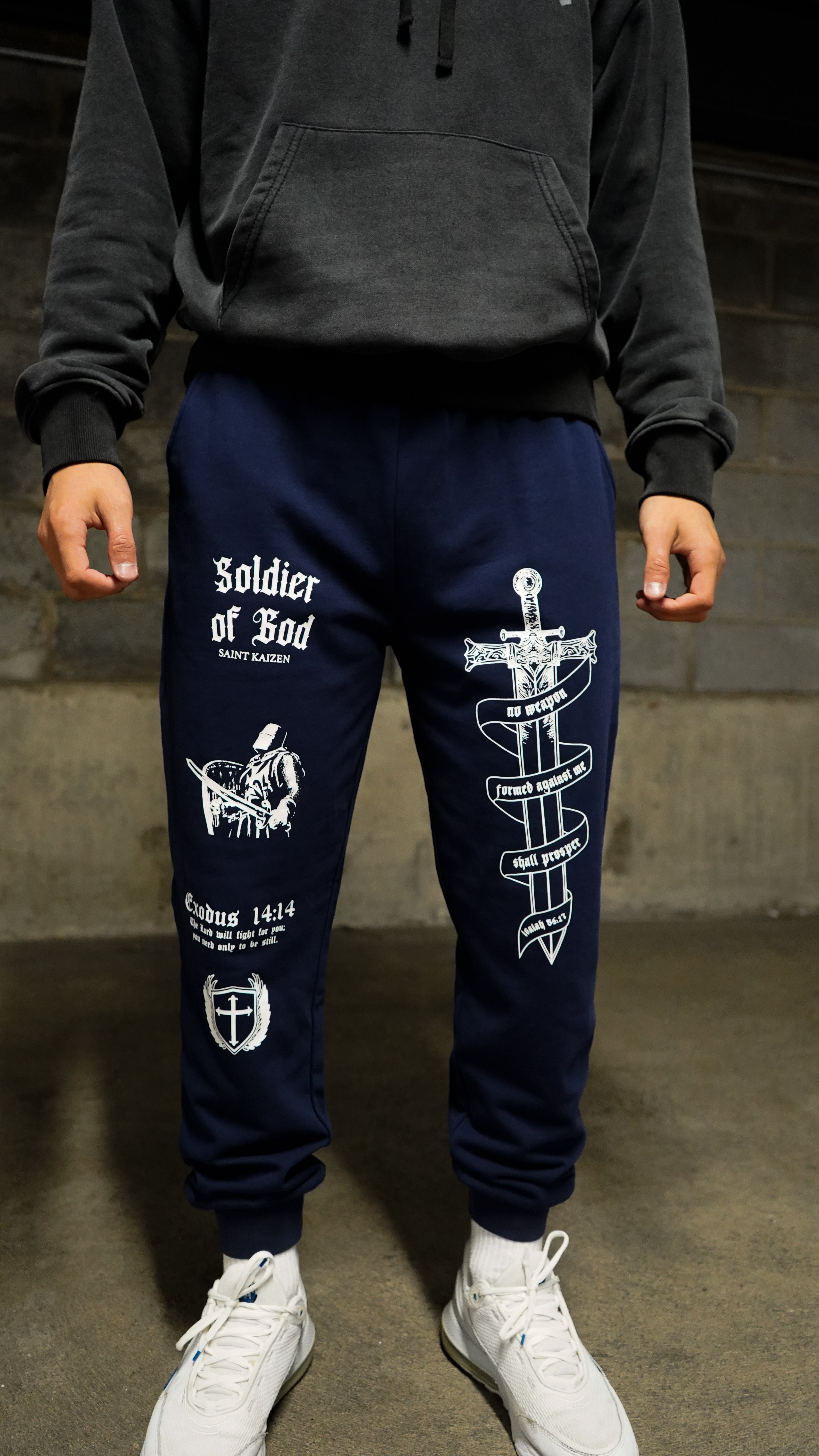 Saint Kaizen Soldier of God Joggers - Navy. Christian gym wear with high-quality screen print design. Terry fleece lining for warmth and comfort.