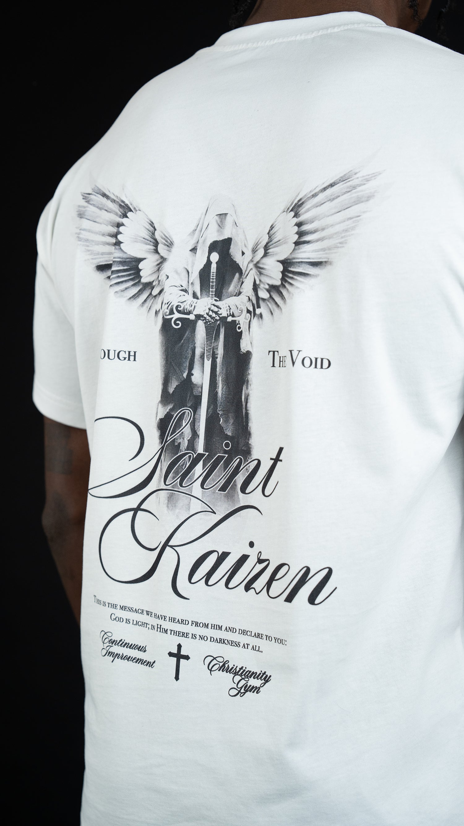 Saint Kaizen Christian gym wear shirt. Features the bold Through To The Void T-Shirt - White spiritual design. Oversize fit made from premium 220gr cotton.