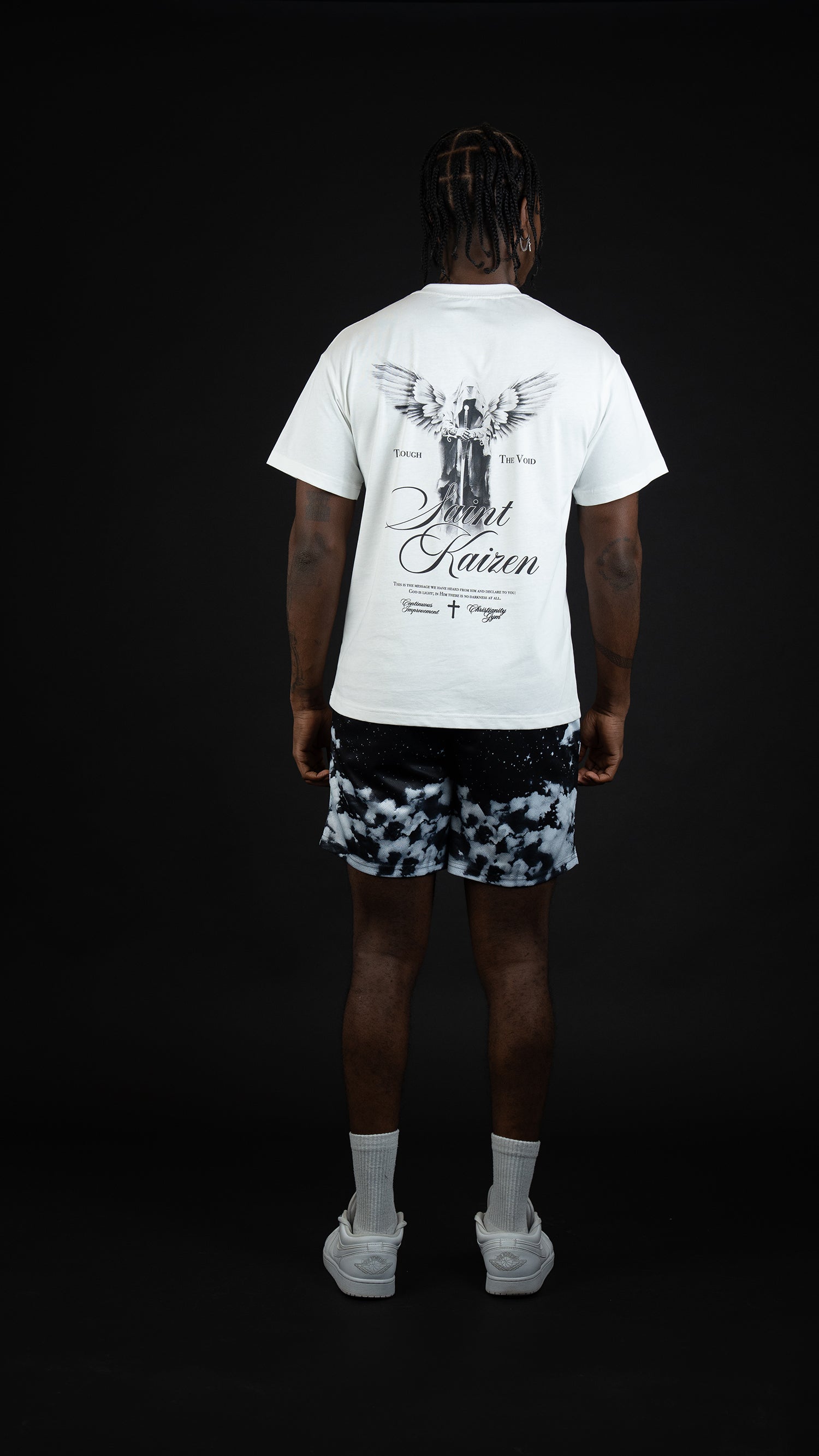 Saint Kaizen Christian gym wear shirt. Features the bold Through To The Void T-Shirt - White spiritual design. Oversize fit made from premium 220gr cotton.