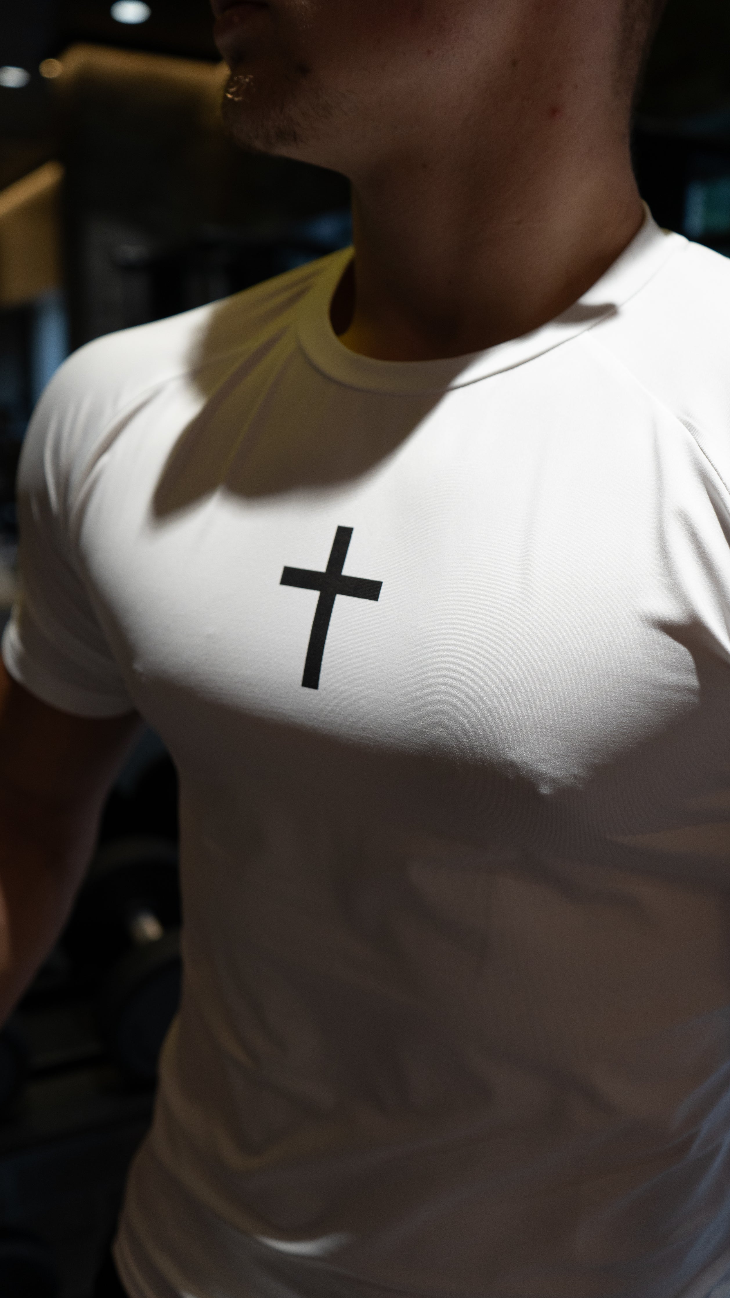 Christian-themed Compression Tee from Gym Wear, featuring gentle compression, moisture-wicking technology, and a second-skin feel for optimal performance and comfort during workouts.