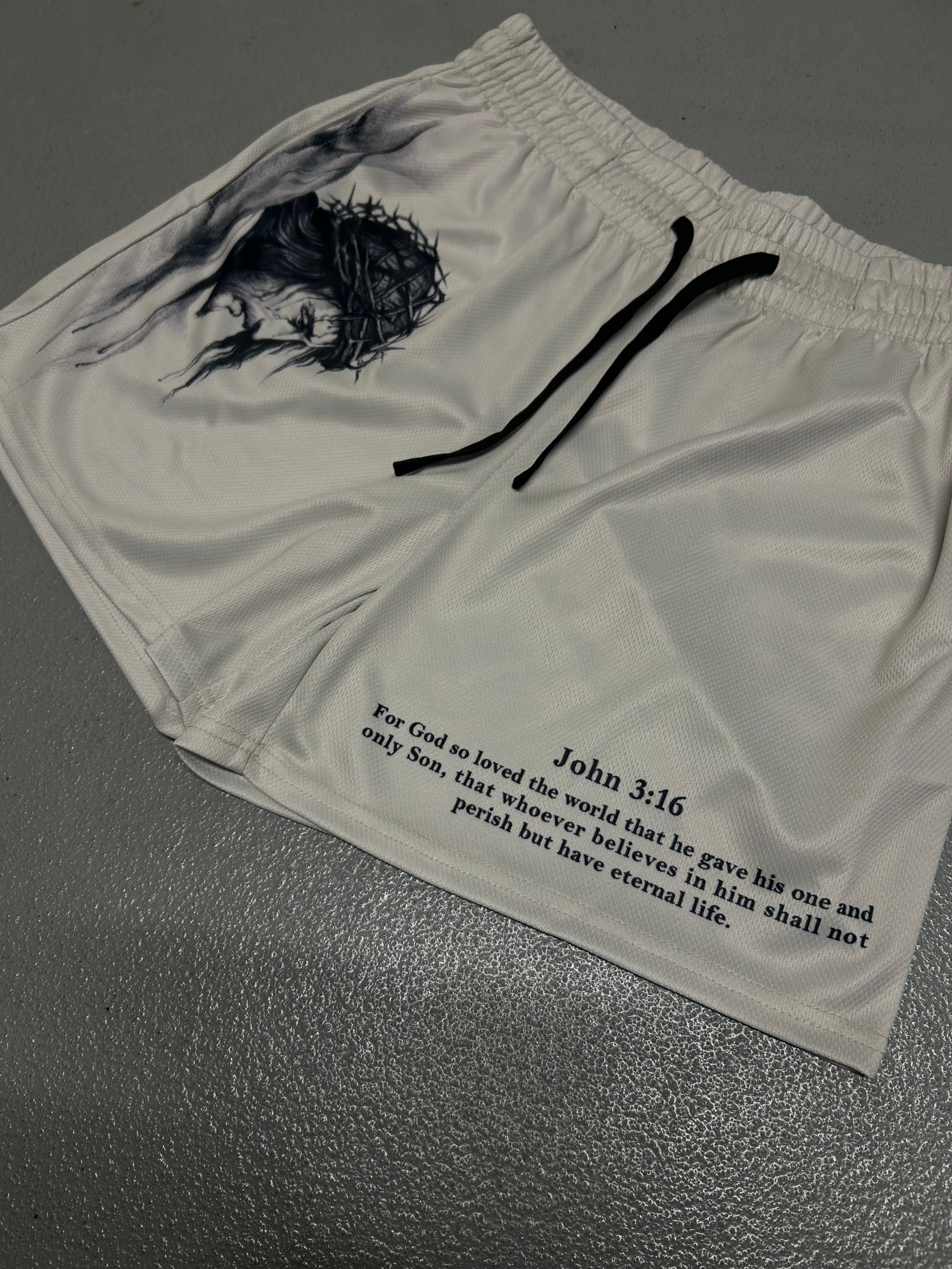 Christian-themed mesh gym shorts with Bible verses, made from 100% polyester, featuring double side pockets and a 5-inch inseam for comfort and mobility.