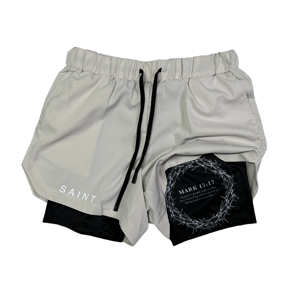 Christian-themed performance shorts with Bible verses, made from a blend of cotton and polyester with a spandex inner lining, featuring Saint Kaizen screen print and multiple pockets for convenience.