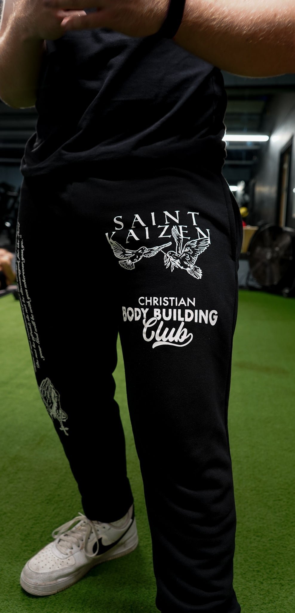 Christian-themed Joggers from Gym Wear, featuring inner drawstrings, premium screenprint, and a terry fleece interior made from 70% cotton, 27% polyester, and 3% spandex for comfort and style.