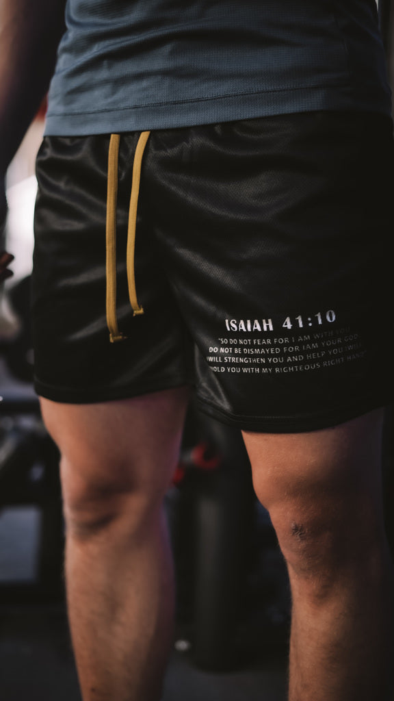 Christian-themed mesh gym shorts with Bible verses, made from 100% polyester, featuring double side pockets and a 5-inch inseam for comfort and mobility.