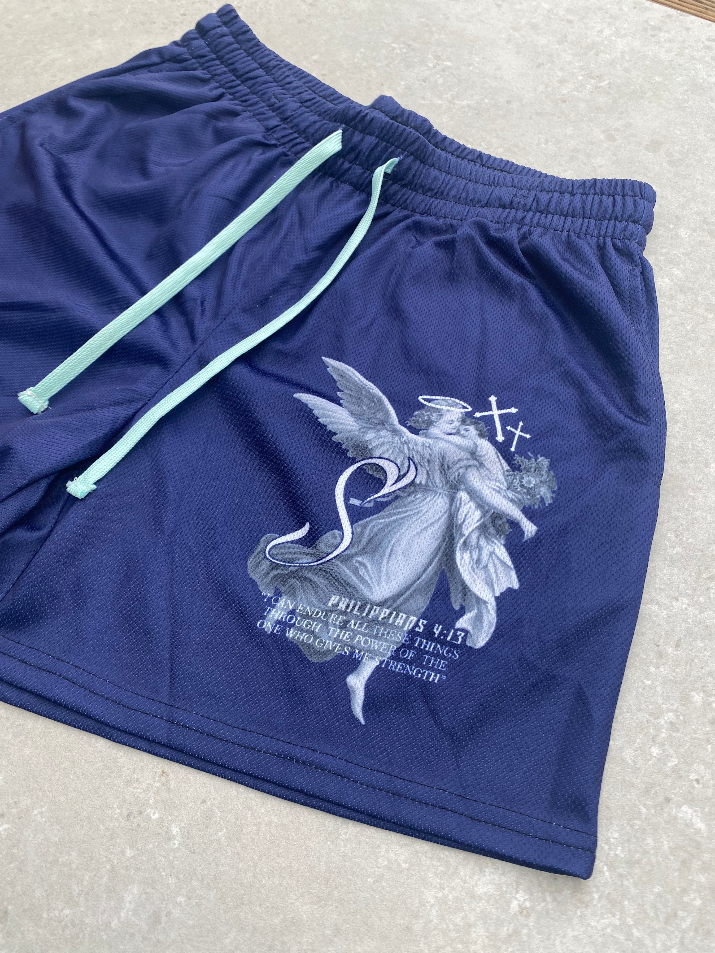 Christian-themed mesh gym shorts with Bible verses, made from 100% polyester, featuring double side pockets and a 5-inch inseam for comfort and mobility.