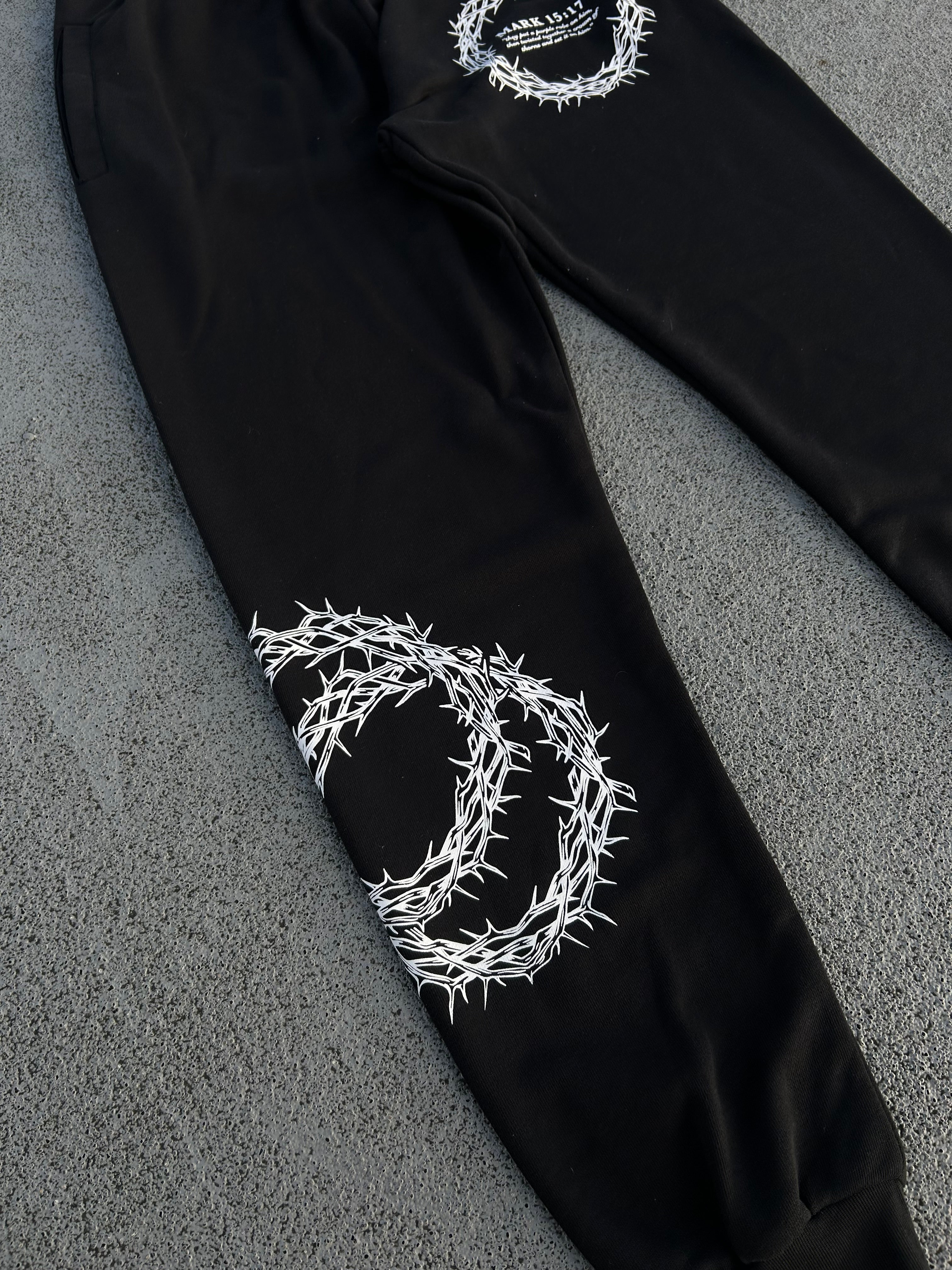 Christian-themed Joggers from Gym Wear, featuring inner drawstrings, premium screenprint, and a terry fleece interior made from 70% cotton, 27% polyester, and 3% spandex for comfort and style.